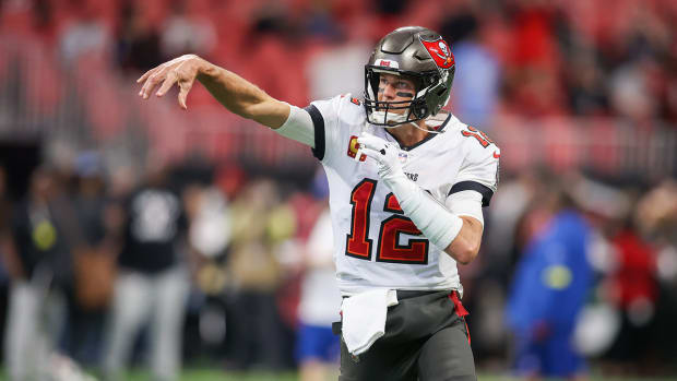 Buccaneers quarterback Tom Brady (12) prepares for a game against the Falcons at Mercedes-Benz Stadium.